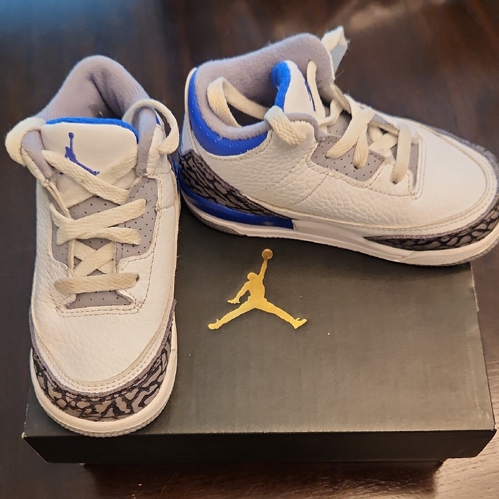 Jordan White and Blue Sneakers Sleek Design